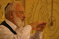 Rav Laitman puts a lecture at the Kabbalah.jpg