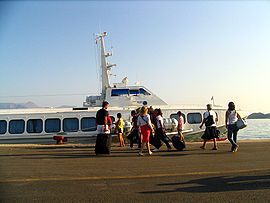Corfu tourists boarding ship bgiu.jpg